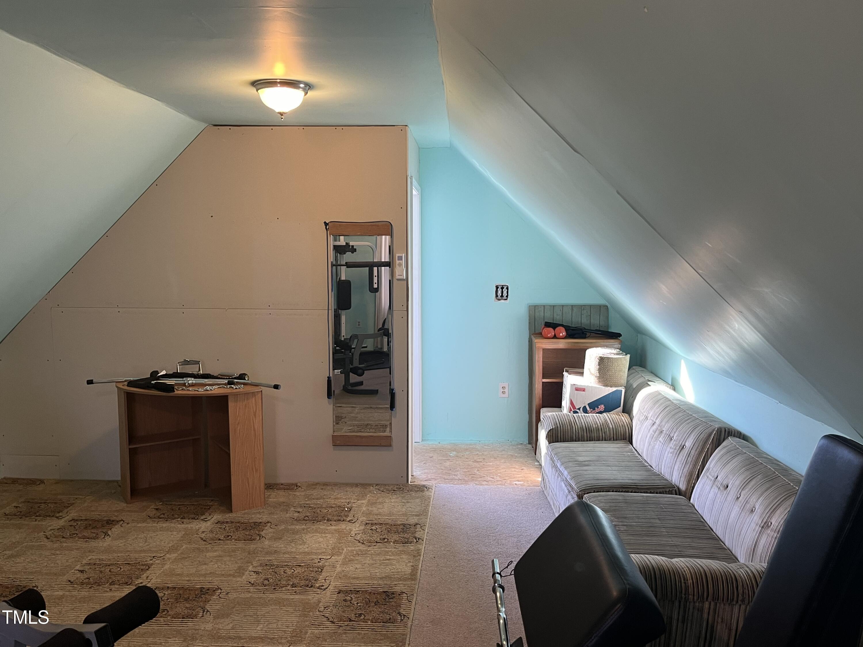 804 Bahama Road Bahama, NC 27503 - Photo 63 of 80 a living room with furniture and a closet