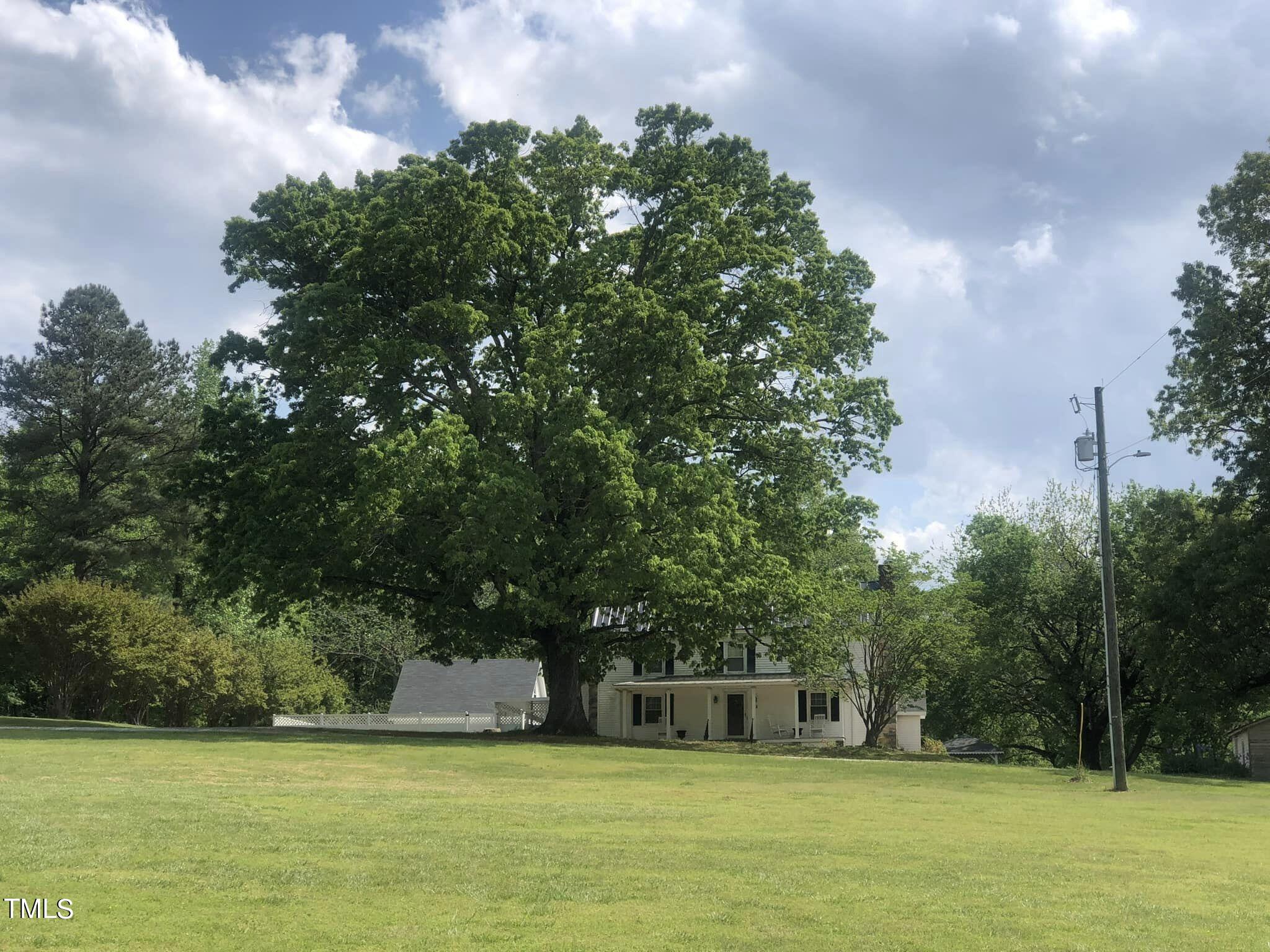 804 Bahama Road Bahama, NC 27503 - Photo 76 of 80 804 Bahama front full greenery