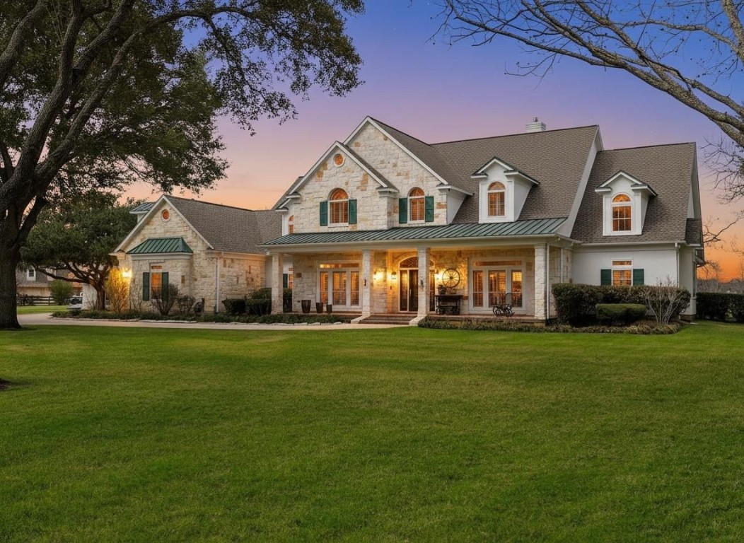 32134 Fulbrook Commons Fulshear, TX 77441 - Photo 1 of 49 A commanding lakefront estate set on 1.88 private acres in Fulbrook. This luxurious waterfront retreat blends architectural scale, mature trees, and resort-style outdoor living, creating a rare combination of privacy, elegance, and natural beauty along Pecan Lake.