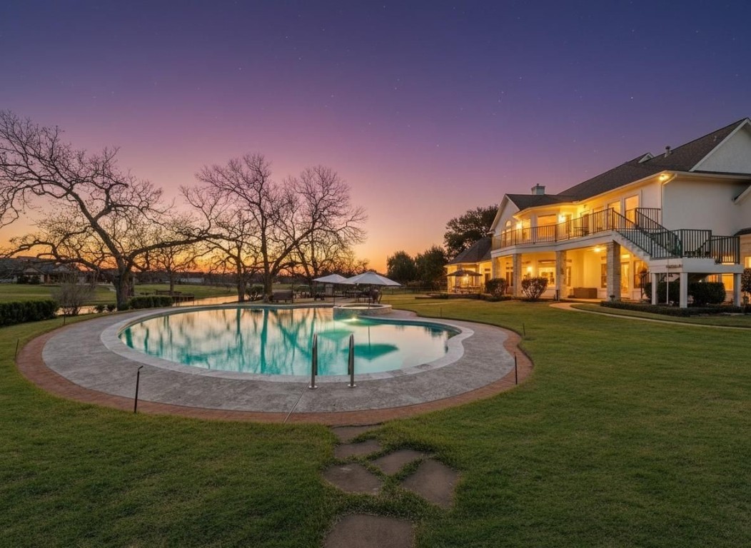 32134 Fulbrook Commons Fulshear, TX 77441 - Photo 45 of 49 Twilight enhanced view of the pool.