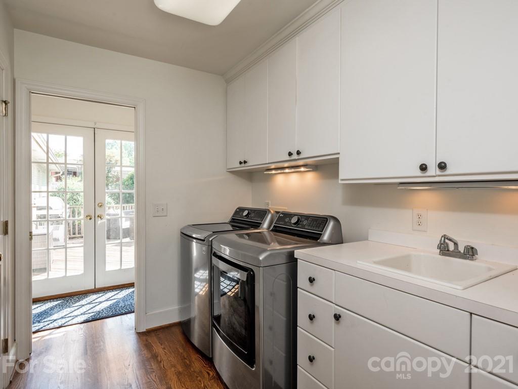 1315 Ferncliff Road Charlotte, NC 28211 - Photo 19 of 44 a utility room with dryer and washer