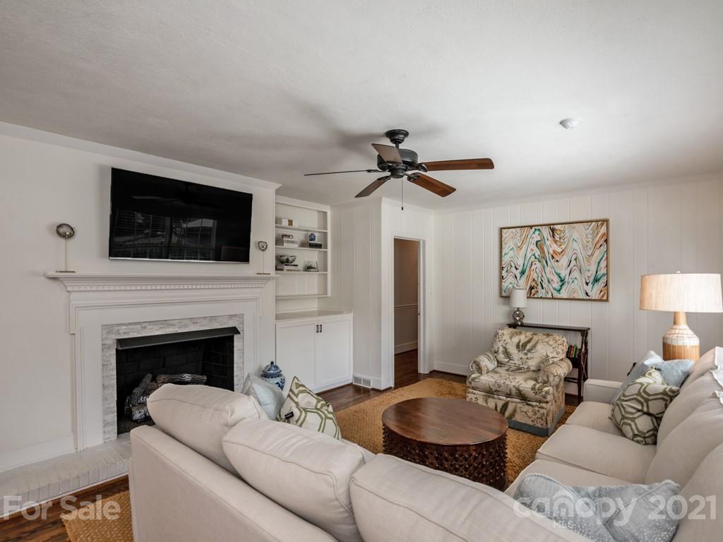 1315 Ferncliff Road Charlotte, NC 28211 - Photo 20 of 44 a living room with furniture and a fireplace