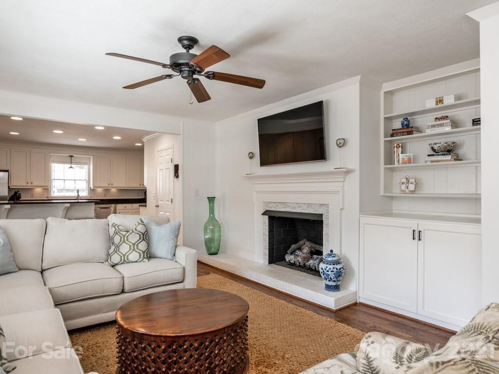 1315 Ferncliff Road Charlotte, NC 28211 - Photo 22 of 44 a living room with furniture and a fireplace