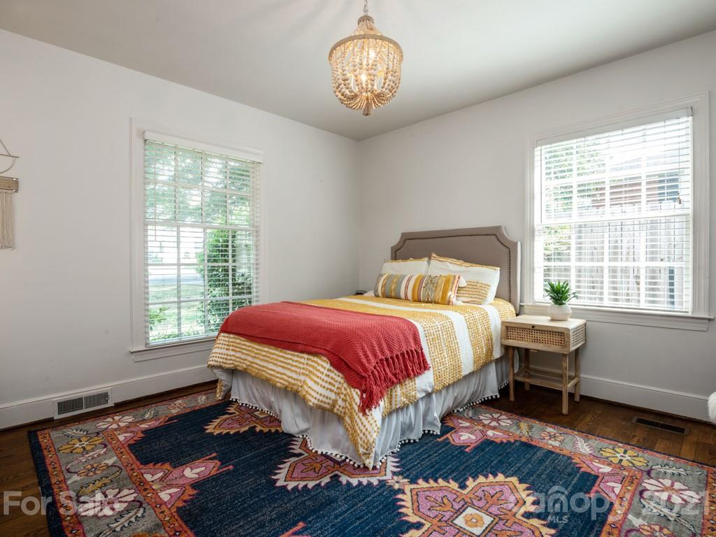 1315 Ferncliff Road Charlotte, NC 28211 - Photo 29 of 44 a bedroom with a bed and a window