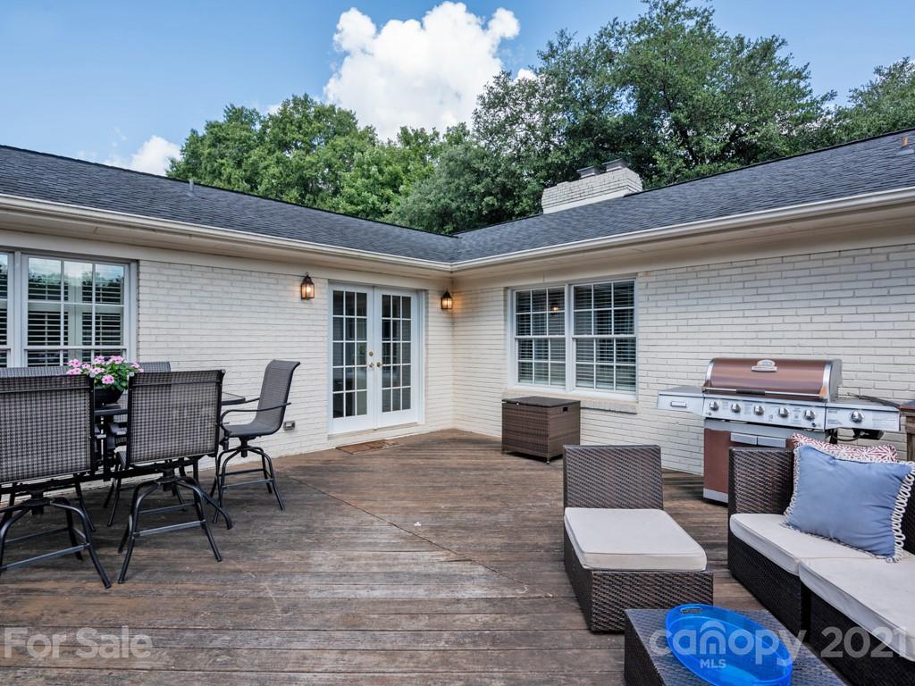 1315 Ferncliff Road Charlotte, NC 28211 - Photo 35 of 44 a outdoor space with patio couches and a fireplace