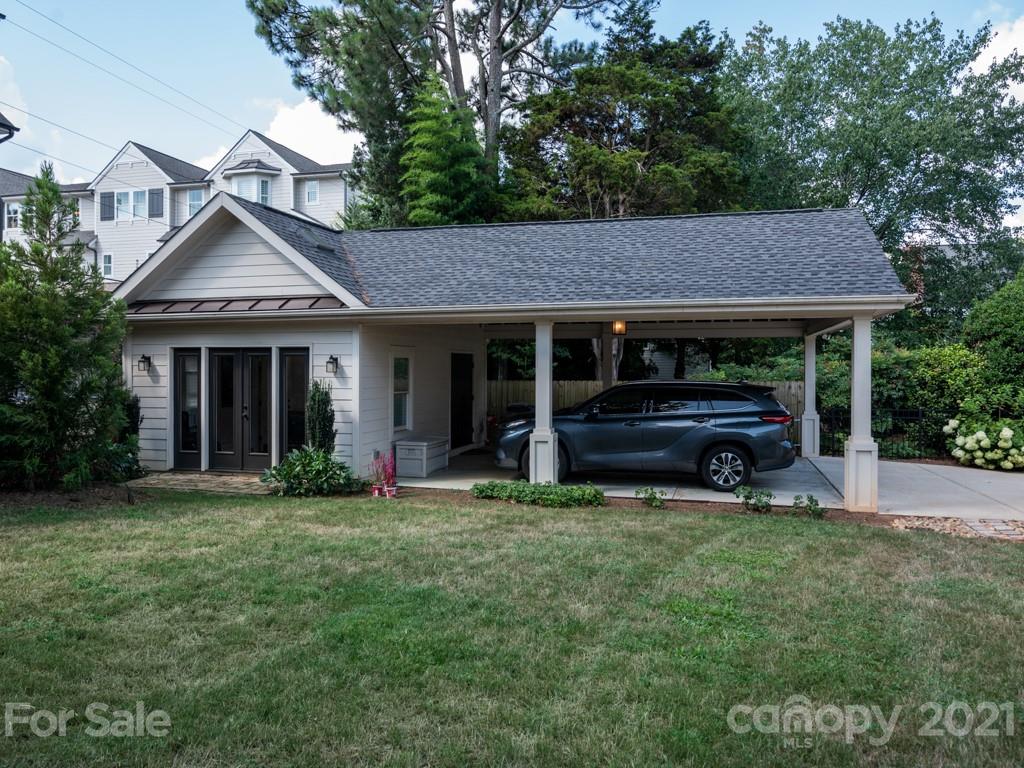 1315 Ferncliff Road Charlotte, NC 28211 - Photo 39 of 44 a view of a house with a yard and large trees