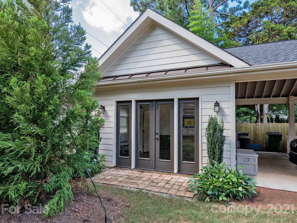 1315 Ferncliff Road Charlotte, NC 28211 - Photo 40 of 44 a view of a house with porch and garden