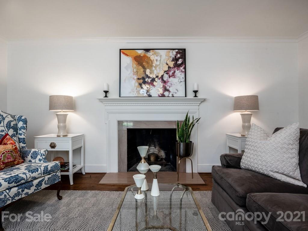 1315 Ferncliff Road Charlotte, NC 28211 - Photo 5 of 44 a living room with furniture and a fireplace