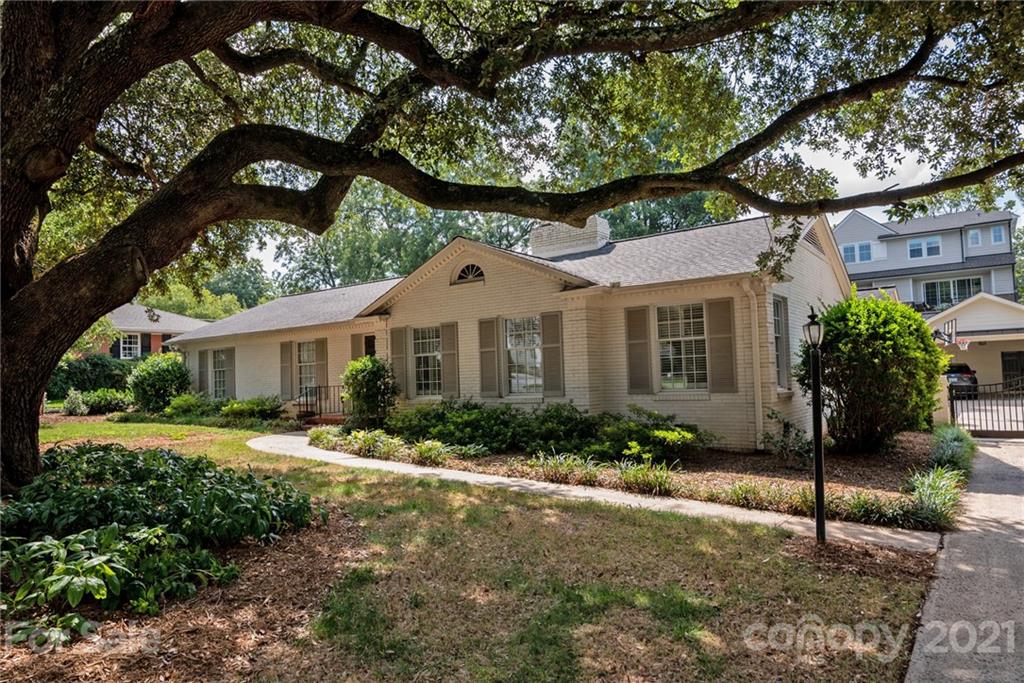 1315 Ferncliff Road Charlotte, NC 28211 - Photo 43 of 44 a front view of a house with a garden