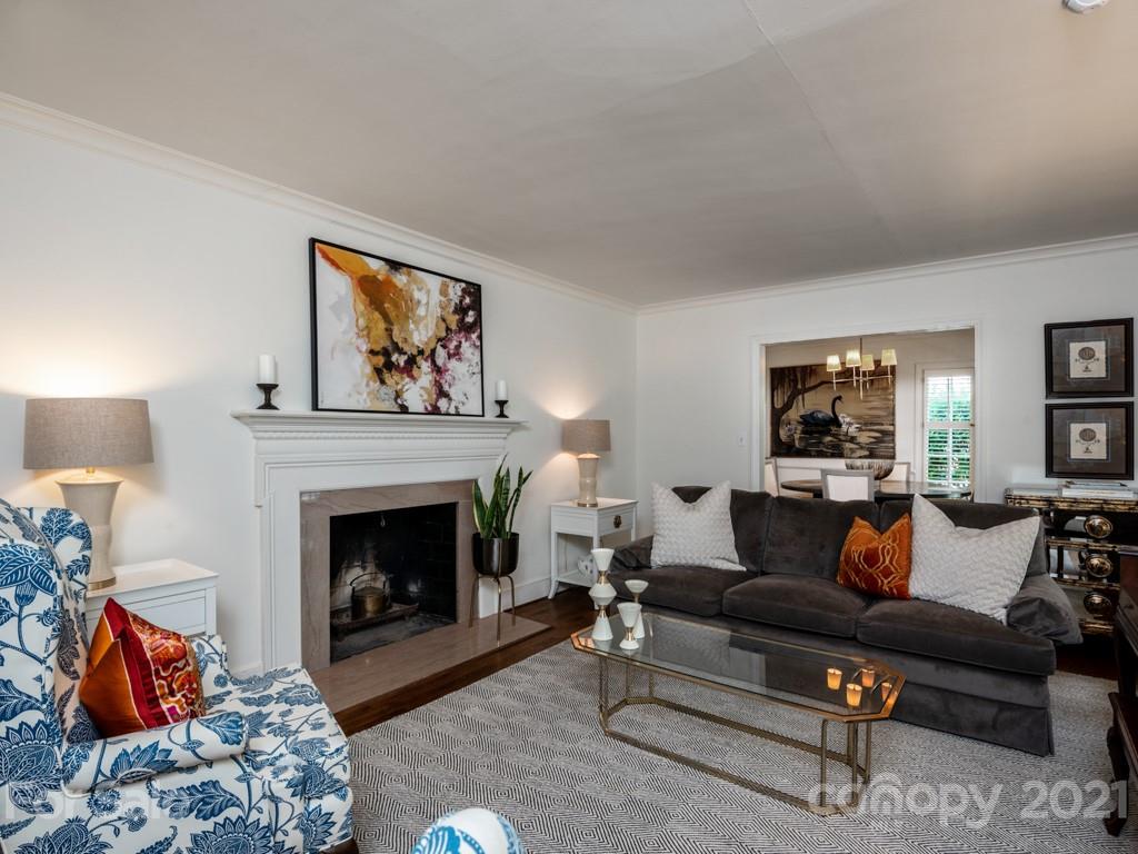 1315 Ferncliff Road Charlotte, NC 28211 - Photo 6 of 44 a living room with furniture and a fireplace