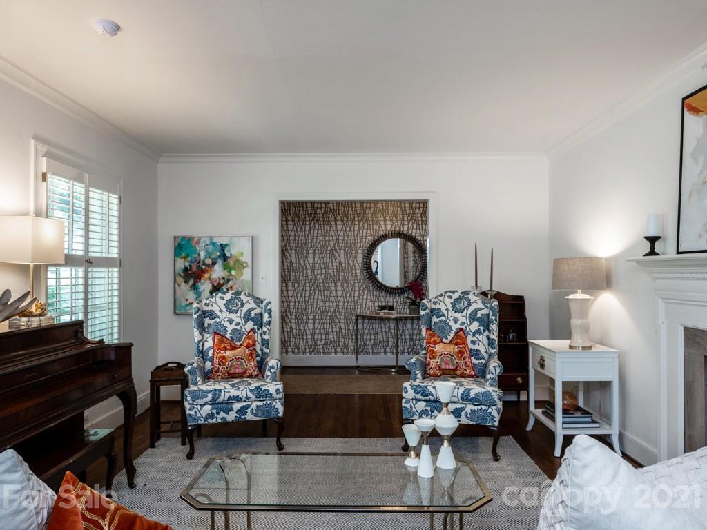 1315 Ferncliff Road Charlotte, NC 28211 - Photo 7 of 44 a bed room with furniture and a fireplace