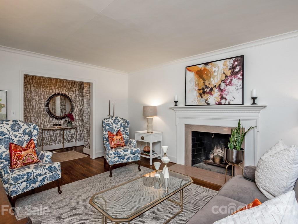 1315 Ferncliff Road Charlotte, NC 28211 - Photo 8 of 44 a living room with furniture and a fireplace