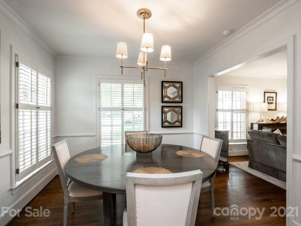 1315 Ferncliff Road Charlotte, NC 28211 - Photo 10 of 44 a view of a dining room with furniture window and wooden floor