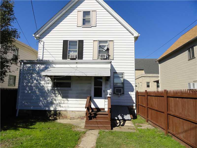 335 Spring Street Latrobe, PA 15650 - Photo 14 of 15 Exterior Back. Back door off the kitchen. Fenced in yard.
