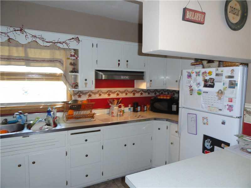 335 Spring Street Latrobe, PA 15650 - Photo 5 of 15 Kitchen. Nice kitchen with breakfast bar and built in oven.
