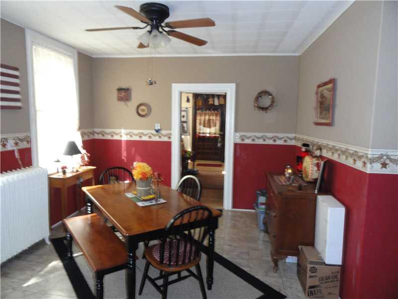 335 Spring Street Latrobe, PA 15650 - Photo 6 of 15 Dining Room. Formal dining room with vinyl flooring.