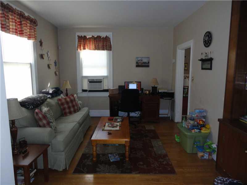 335 Spring Street Latrobe, PA 15650 - Photo 7 of 15 Family Room. Family room off the kitchen with built ins.