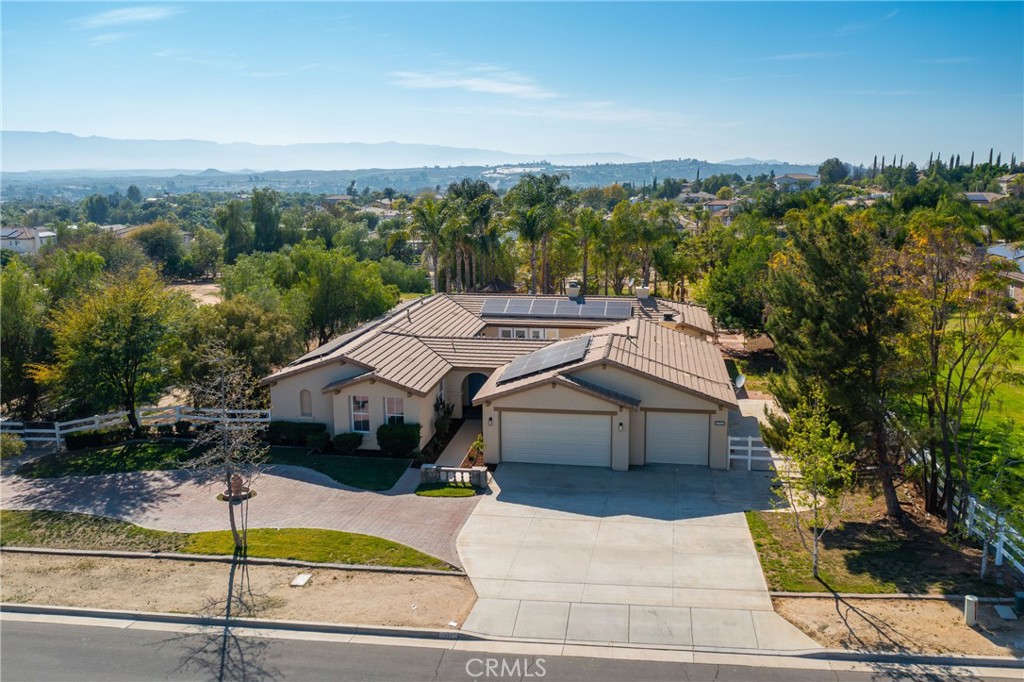 17741 Laurel Grove Road Riverside, CA 92504 - Photo 2 of 62 a aerial view of a house with swimming pool and mountains