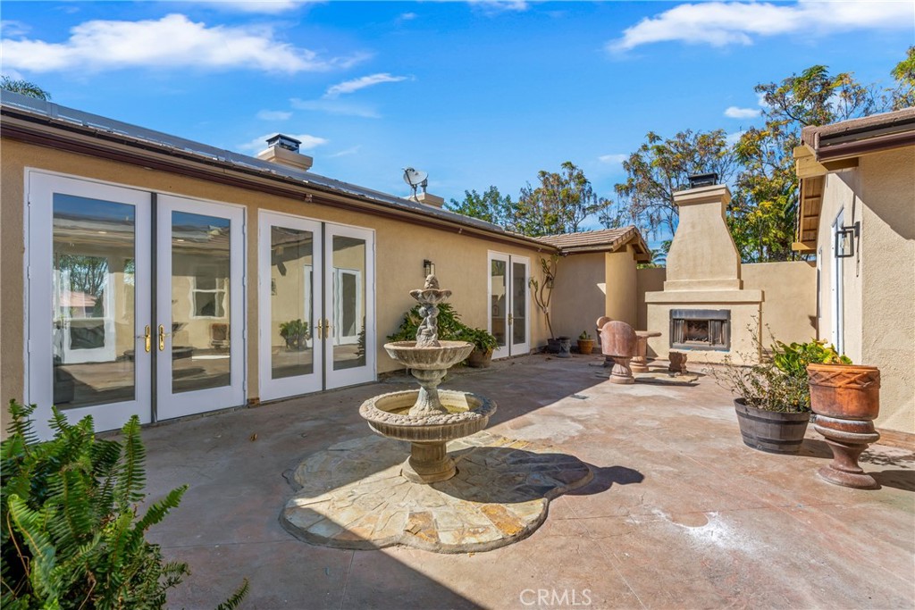 17741 Laurel Grove Road Riverside, CA 92504 - Photo 28 of 62 a view of a house with sitting area and garden
