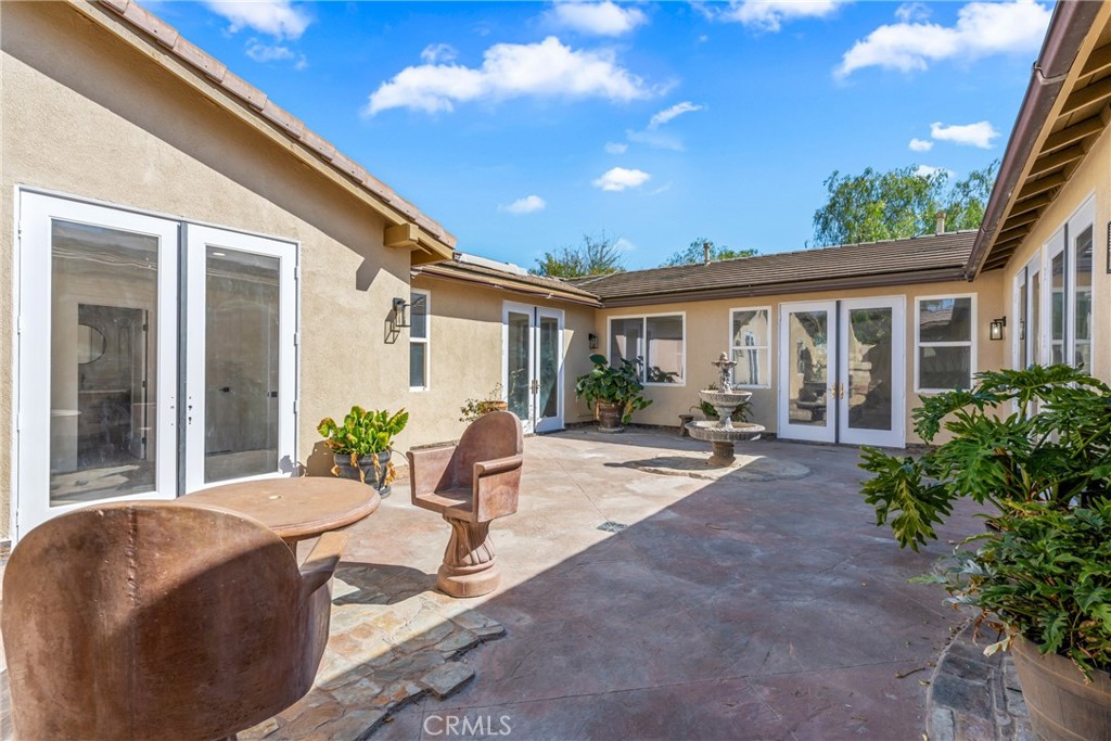 17741 Laurel Grove Road Riverside, CA 92504 - Photo 29 of 62 a view of a house with backyard and sitting area