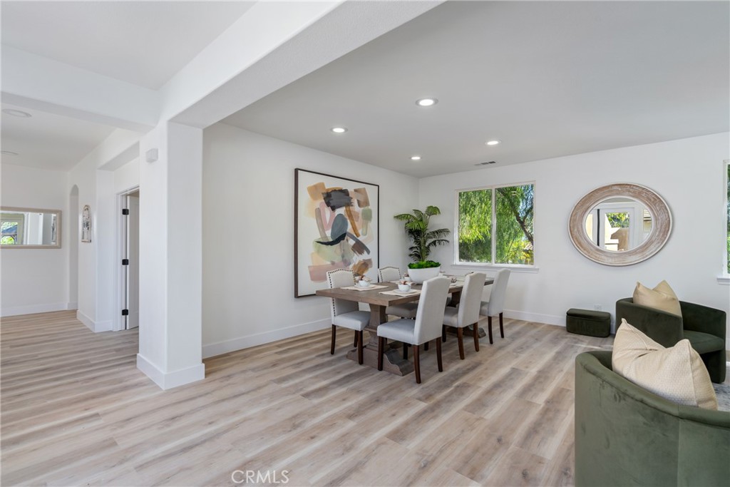 17741 Laurel Grove Road Riverside, CA 92504 - Photo 30 of 62 a view of a dining room with furniture and a window