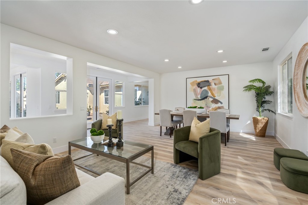 17741 Laurel Grove Road Riverside, CA 92504 - Photo 35 of 62 a living room with furniture and wooden floor