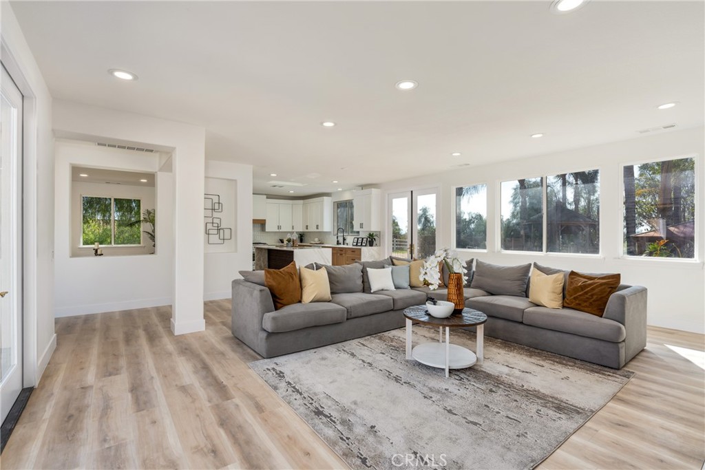 17741 Laurel Grove Road Riverside, CA 92504 - Photo 41 of 62 a living room with furniture and a large window