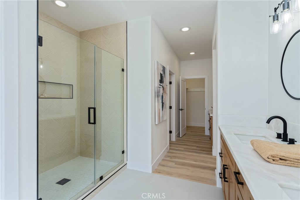 17741 Laurel Grove Road Riverside, CA 92504 - Photo 54 of 62 a bathroom with a sink and shower