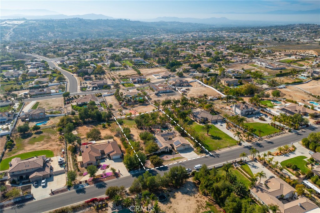 17741 Laurel Grove Road Riverside, CA 92504 - Photo 6 of 62 an aerial view of residential houses with outdoor space