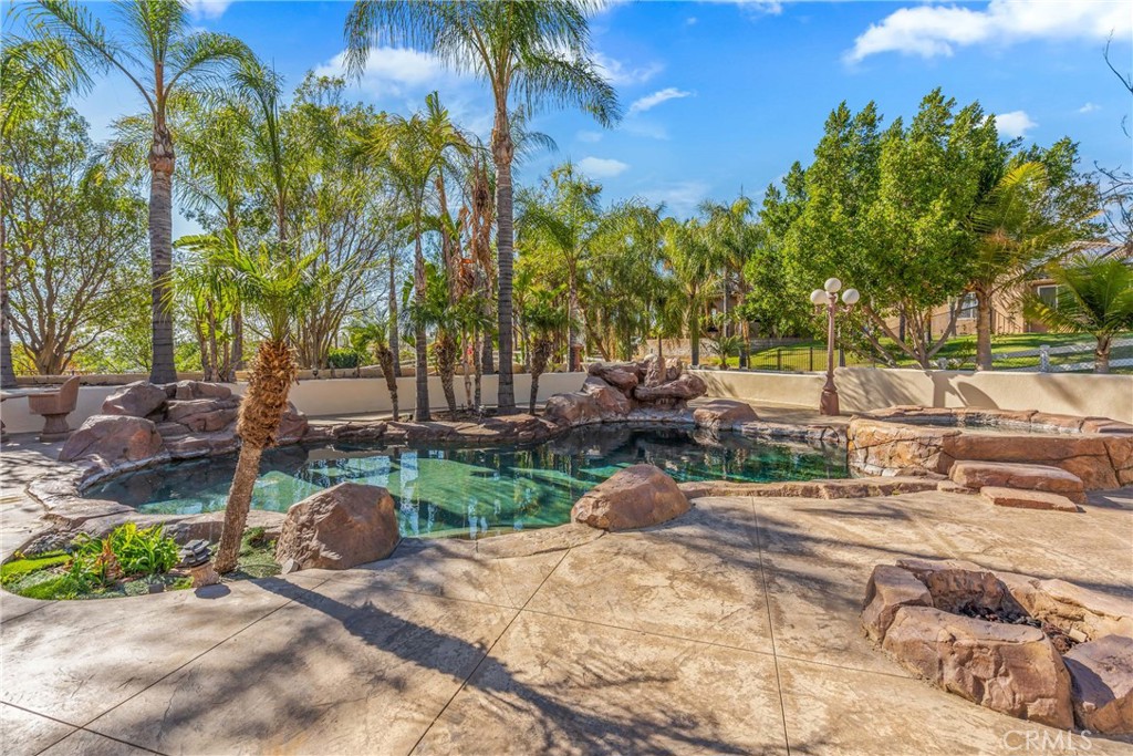17741 Laurel Grove Road Riverside, CA 92504 - Photo 62 of 62 a view of backyard with outdoor seating and trees
