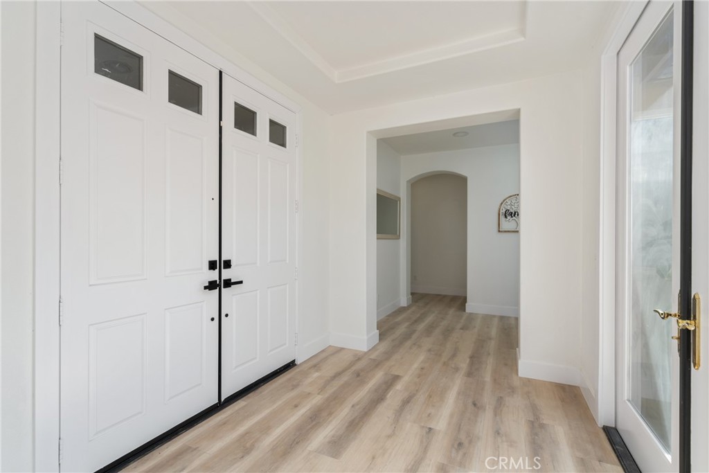 17741 Laurel Grove Road Riverside, CA 92504 - Photo 8 of 62 a view of a hallway with closet area