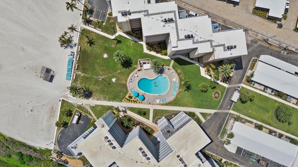 5830 Midnight Pass Road, Unit 52 Sarasota, FL 34242 - Photo 27 of 32 an aerial view of a house with a swimming pool