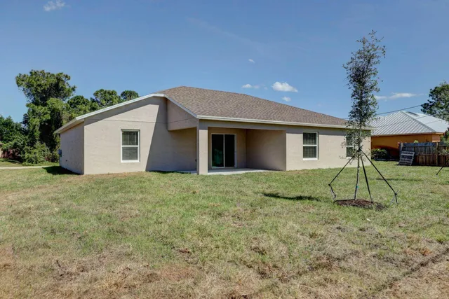 a house view with a garden space