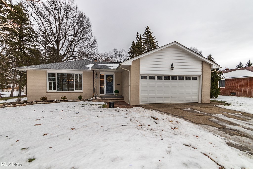 Ranch home featuring a two car attached garage