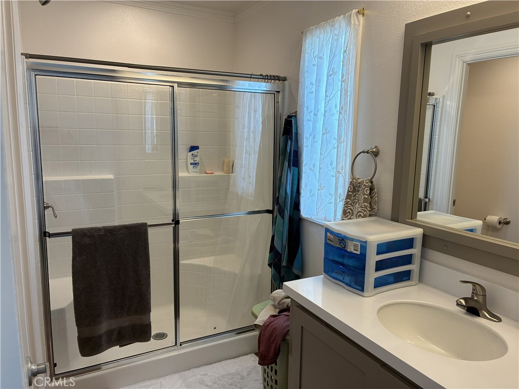 655 South Halcyon Road Arroyo Grande, CA 93420 - Photo 11 of 12 a bathroom with a sink and a mirror