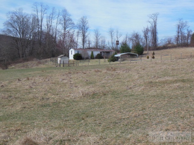 522 Quincy Road Sparta, NC 28675 - Photo 9 of 20 a view of outdoor space with trees