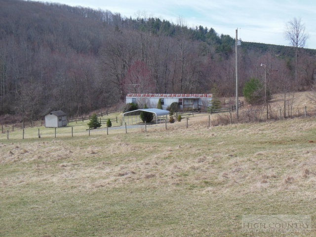 522 Quincy Road Sparta, NC 28675 - Photo 10 of 20 a view of backyard with table and chairs