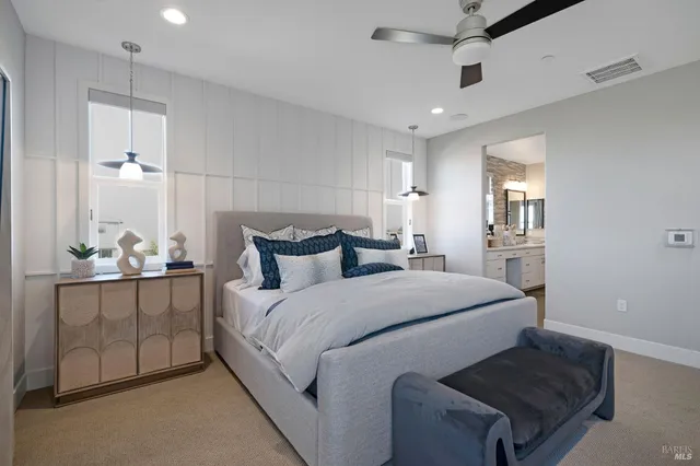 a bedroom with furniture