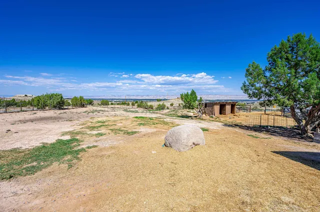 a view of a swimming pool with an outdoor space and seating area