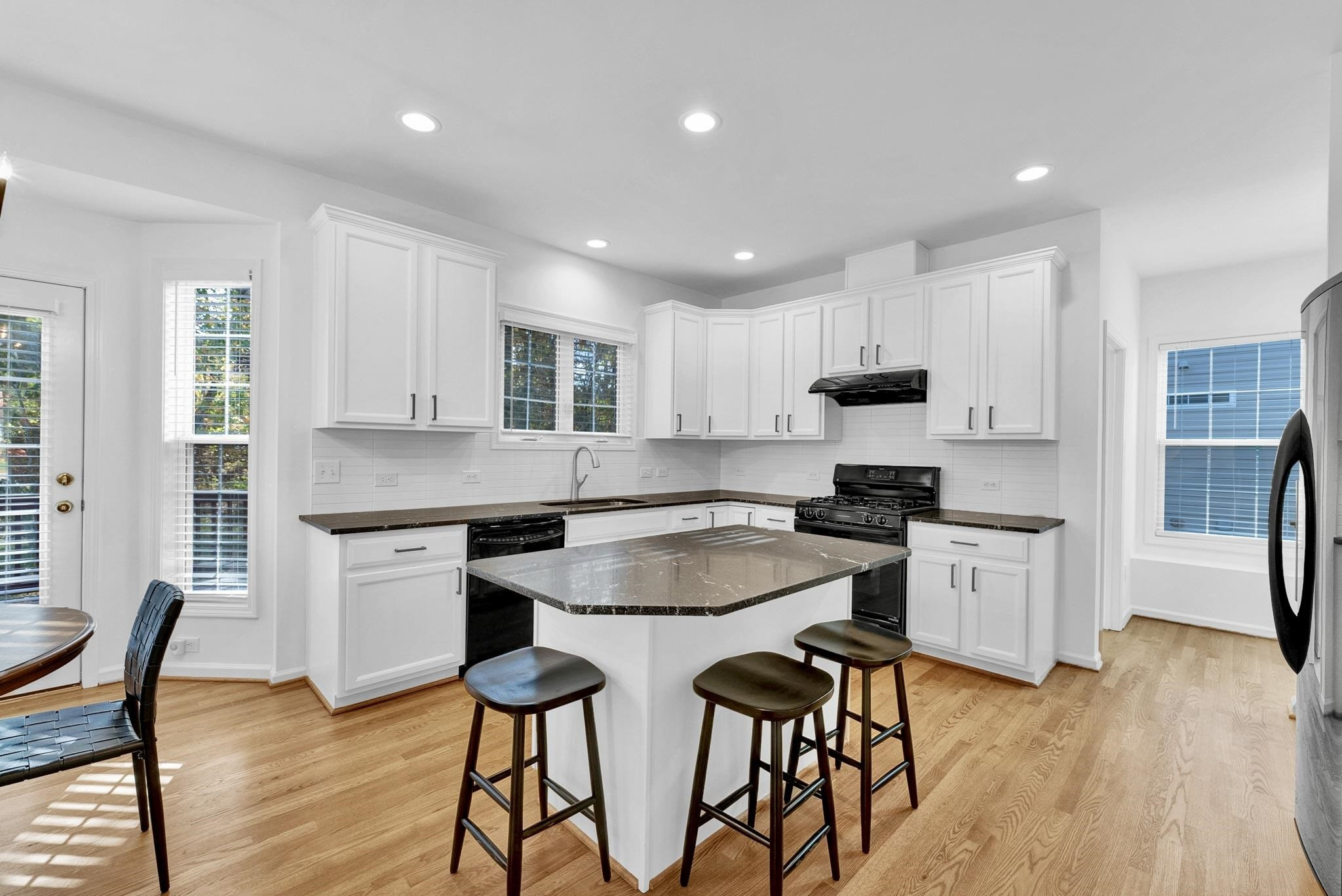112 Timber Hitch Road Cary, NC 27513 - Photo 17 of 50 An island comfortably sitting 3 barstools! Kitchen