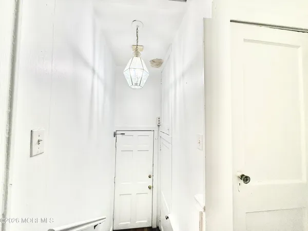 a view of a livingroom with wooden floor