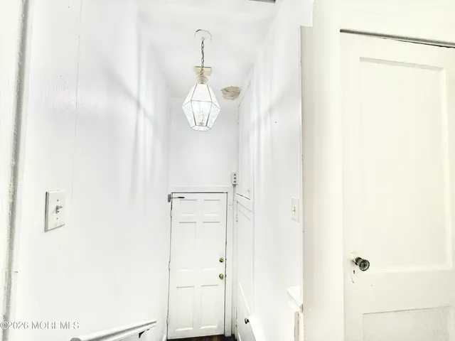 a view of a livingroom with wooden floor