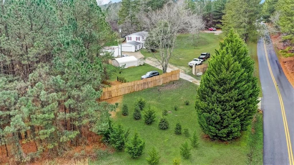 264 Bell Road Dallas, GA 30157 - Photo 1 of 1 a view of a garden