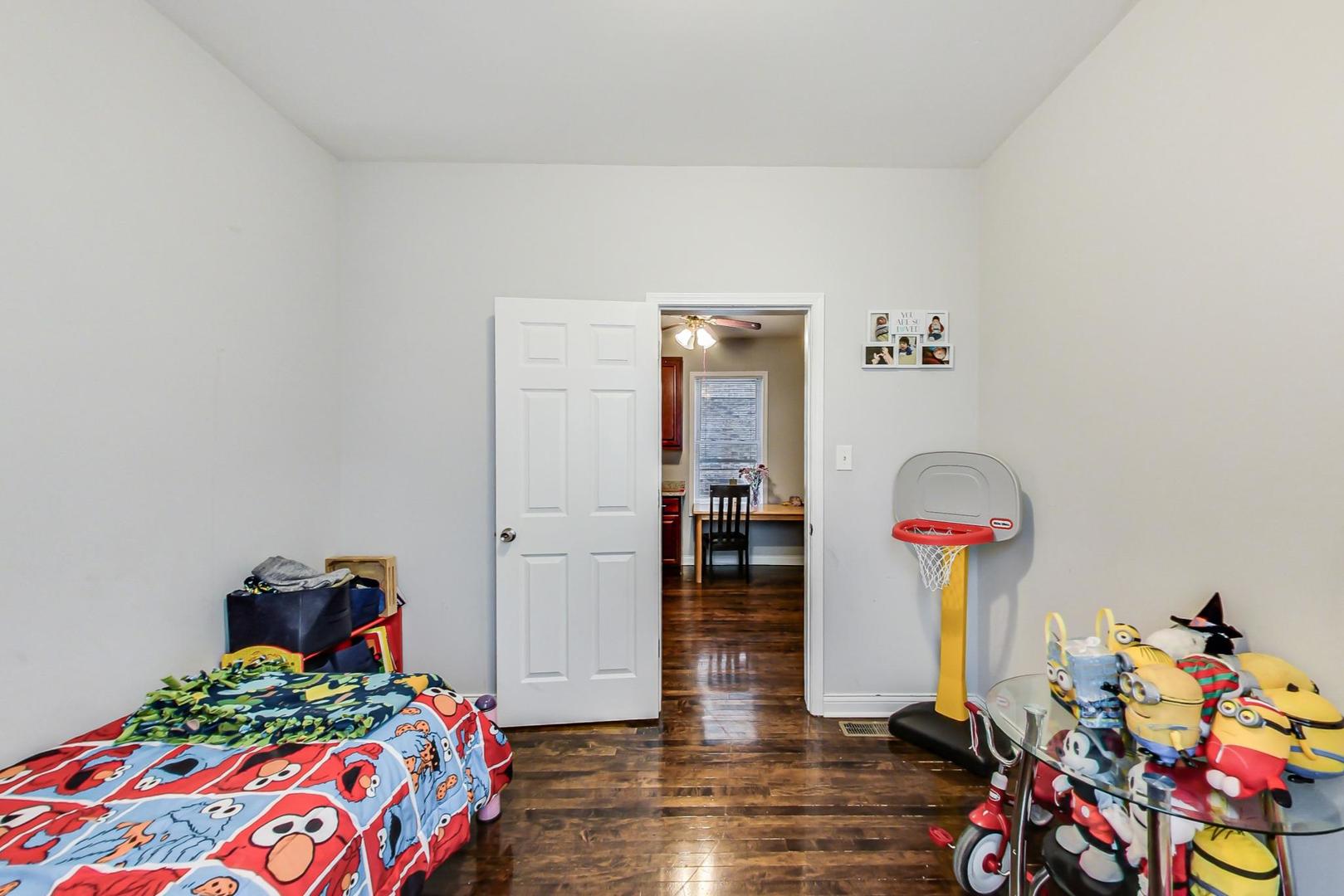 4237 West School Street Chicago, IL 60641 - Photo 20 of 72 a bedroom with bed and closet