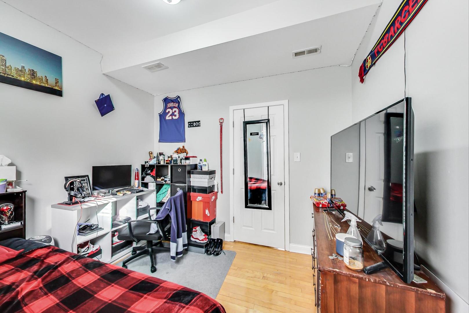 4237 West School Street Chicago, IL 60641 - Photo 35 of 72 a view of a workspace with furniture and toys