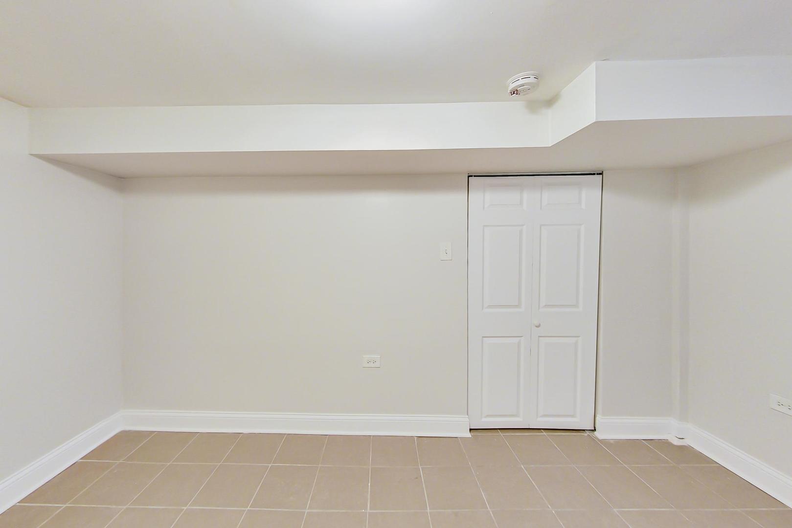 4237 West School Street Chicago, IL 60641 - Photo 62 of 72 a view of an empty room