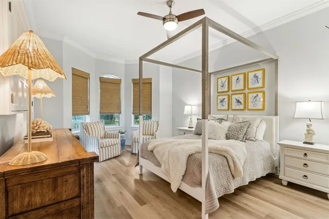 a view of a hallway with paintings on the wall