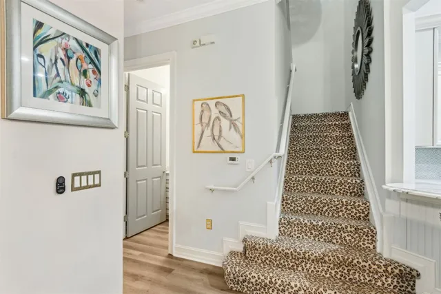 a bedroom with bed and window