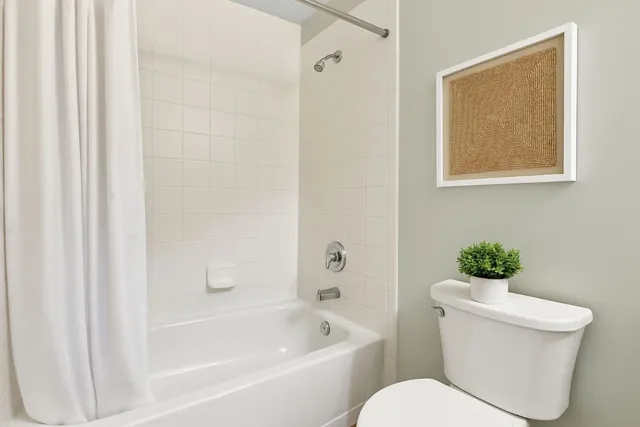 a utility room with a sink dryer and washer