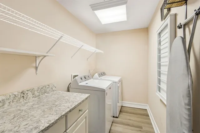 a house with a tree in front of it